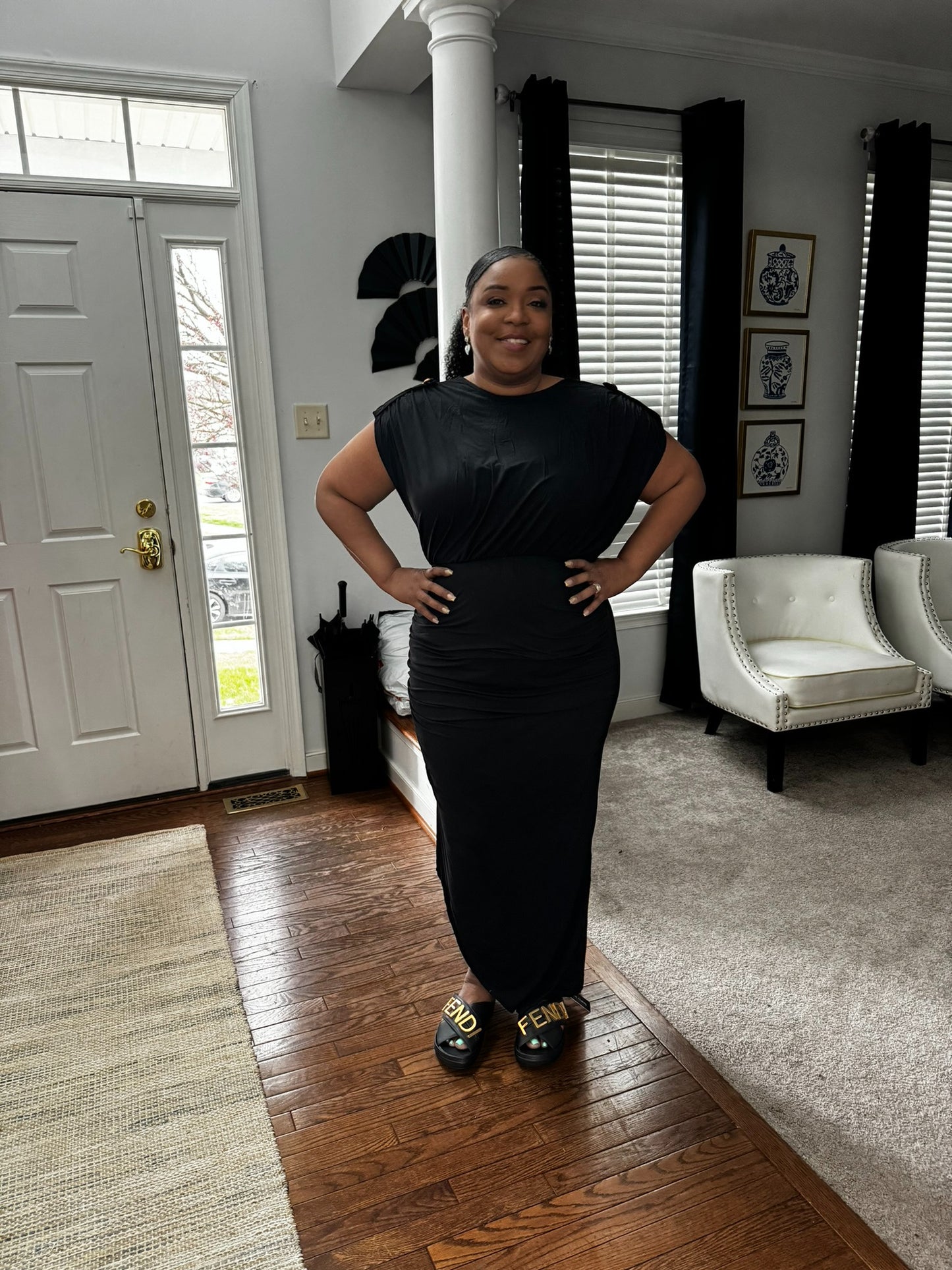 Off the Chain | Black Sleeveless Dress With Gold Chain Accent